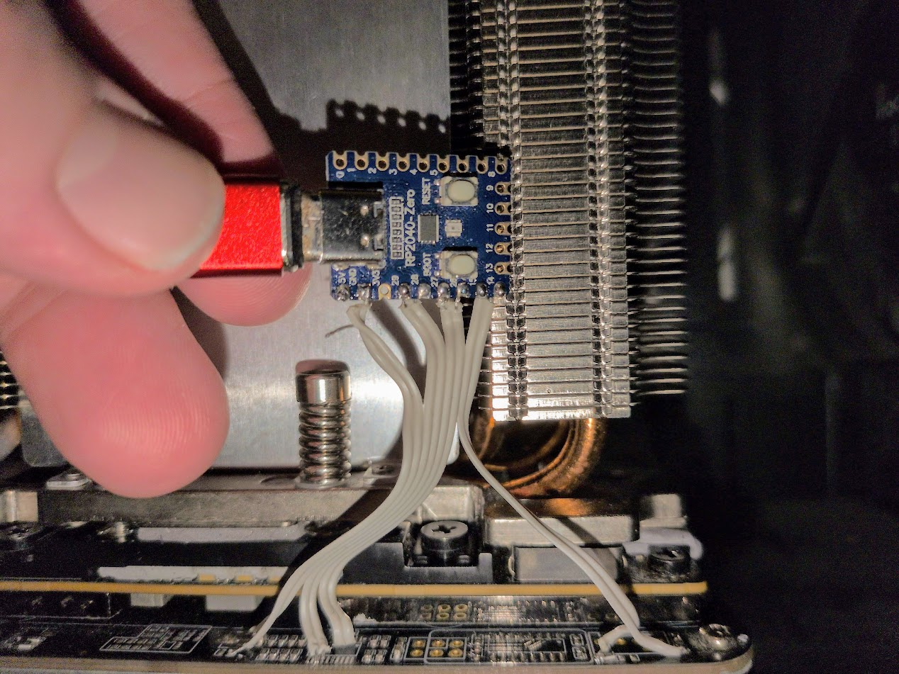 The RP2040-Zero wired in against the V100 cooler