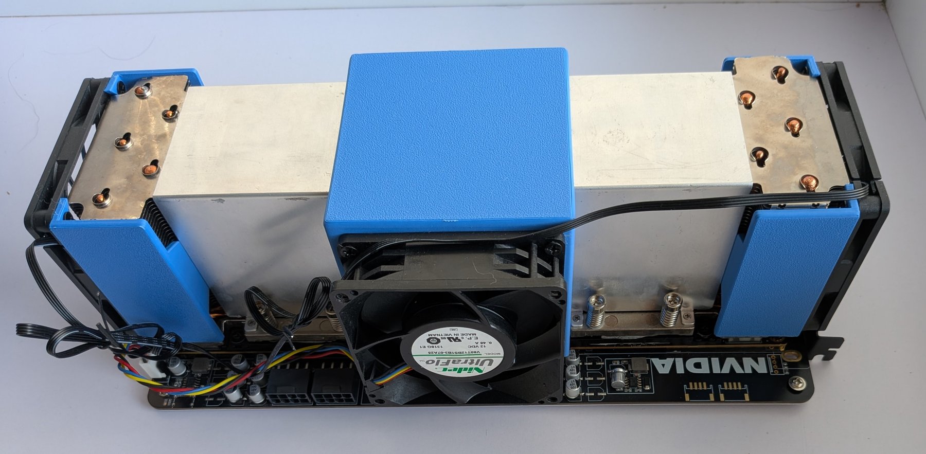 the printed shrouds and central fan duct installed on the dual-V100 board