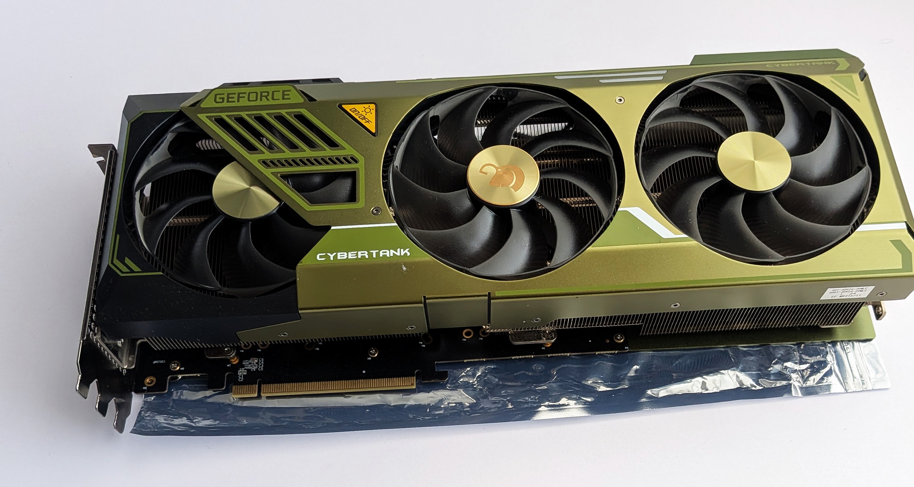 A single V100, the green Cybertank-shrouded card
