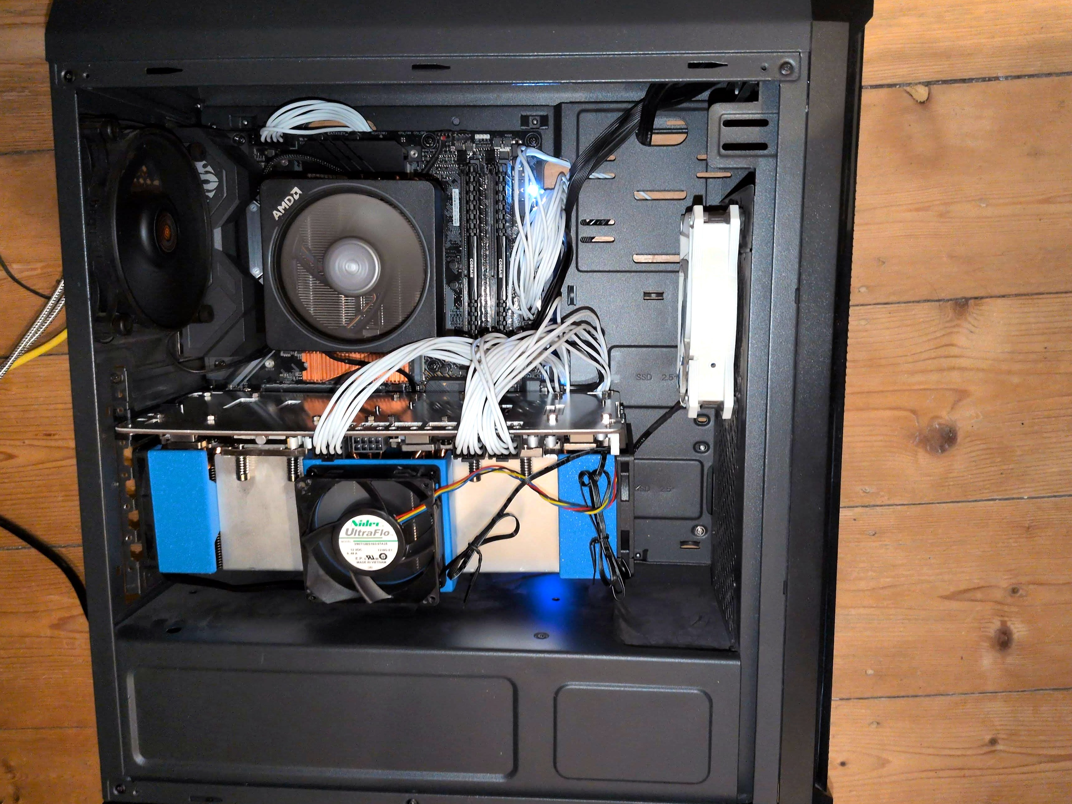 Two V100s stacked on the NVLink carrier, installed in the box